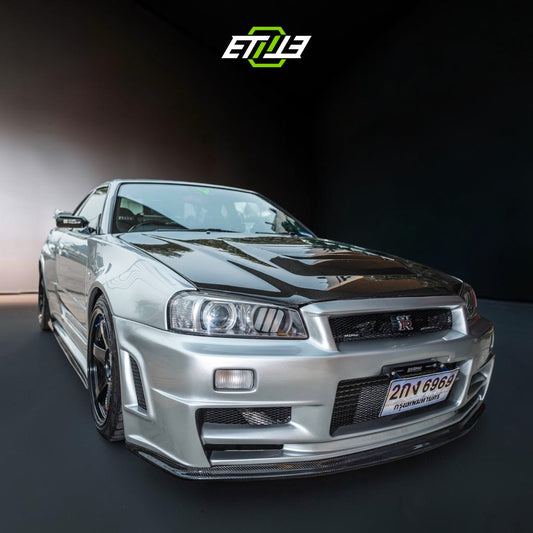 R34 Z-Tune style carbon vented hood — dry carbon, front view, ETi