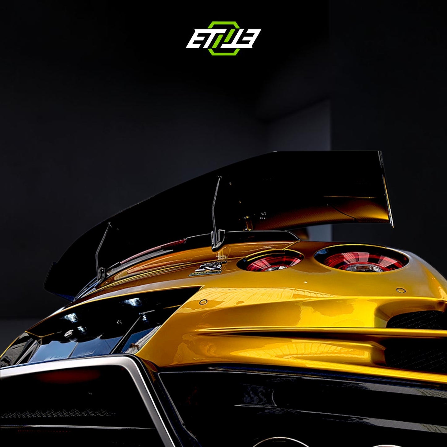 R35 Top spoiler — carbon fiber weave detail, ETi
