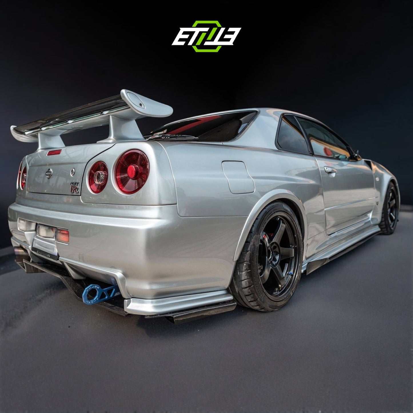 R34 Z-Tune style front fenders — bespoke carbon, front view, ETi