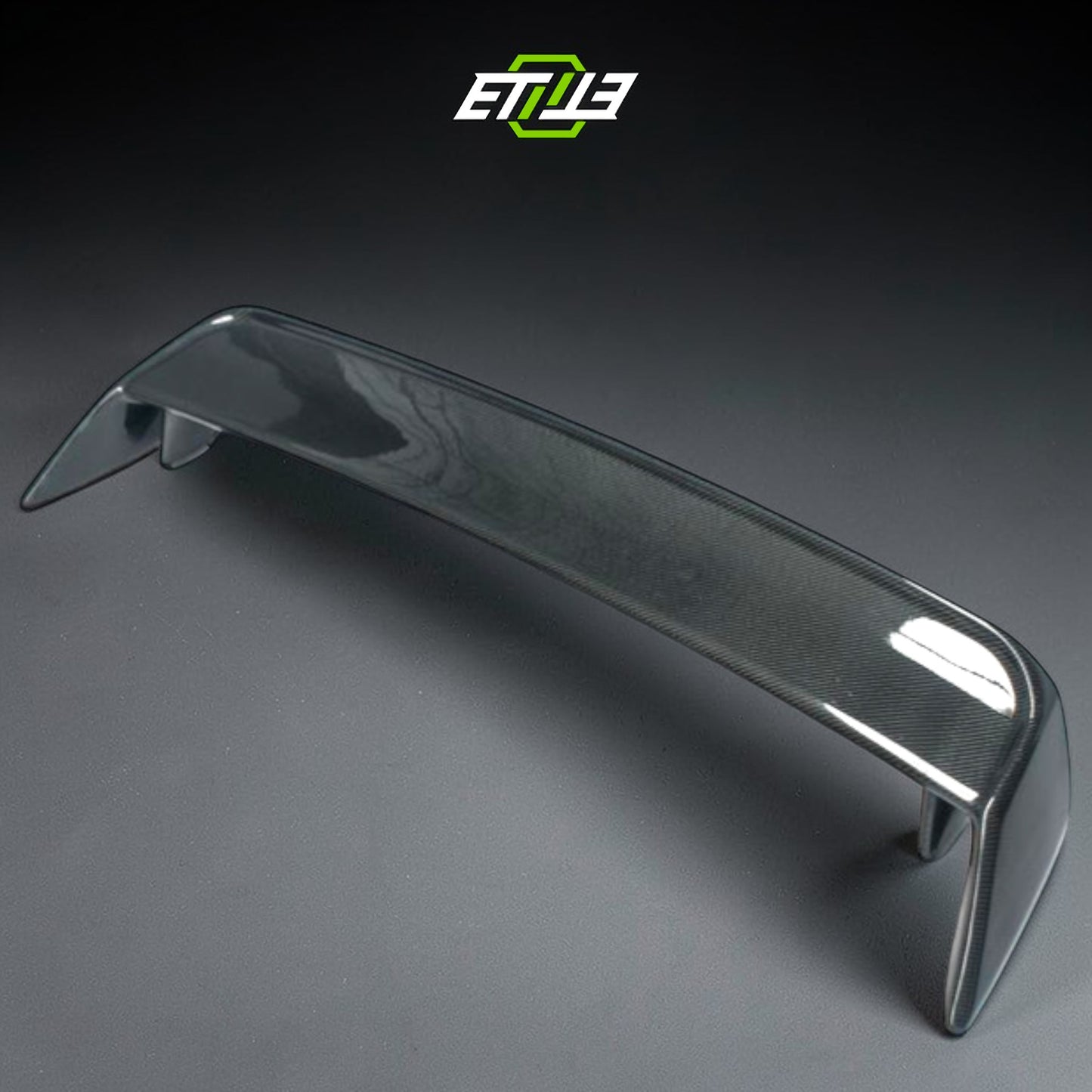 R32 OEM-style rear spoiler — bespoke carbon, underside detail, ETi