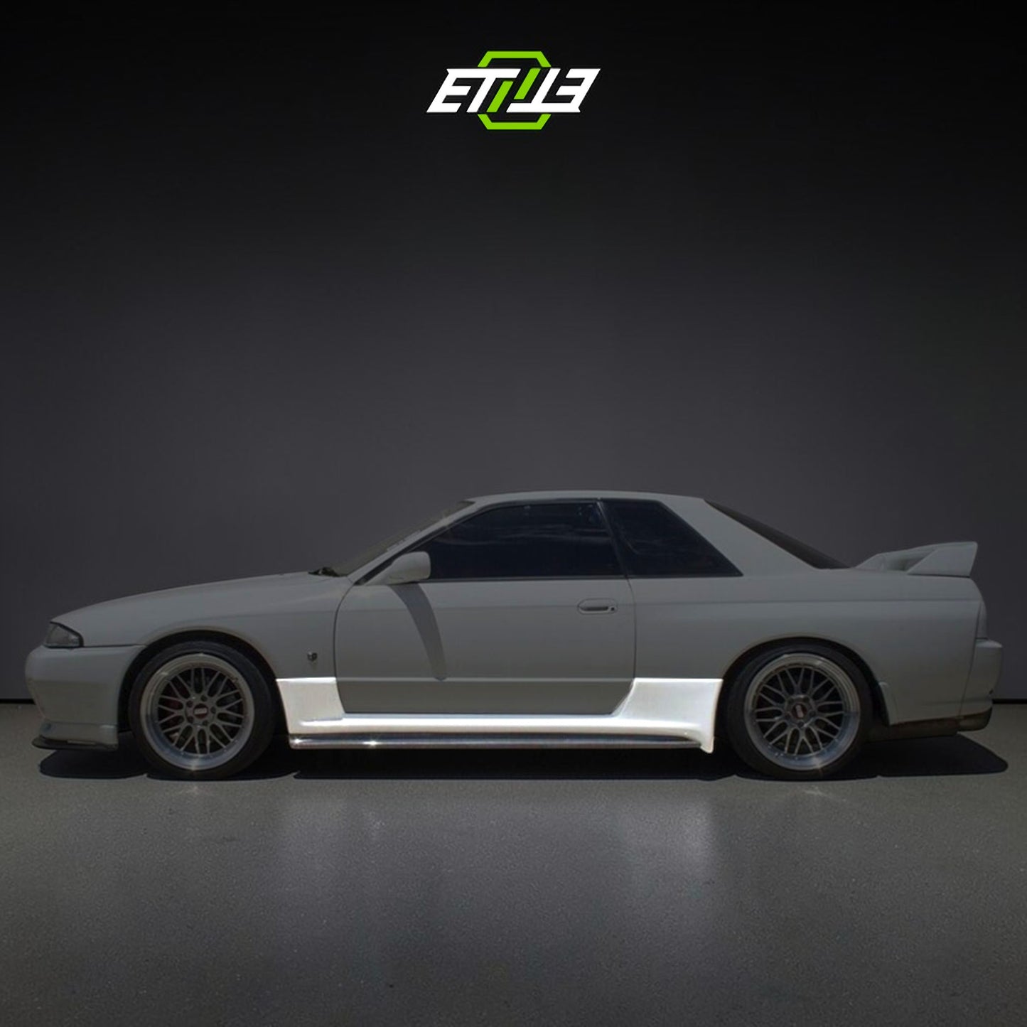 R32 N1 style side skirt add-on — carbon fiber, profile view, ETi