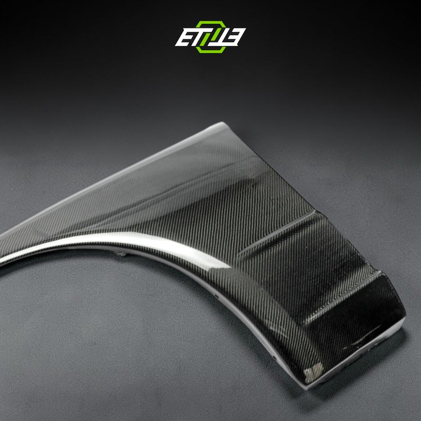 R32 OEM style front fenders — bespoke carbon, rear three-quarter view, ETi