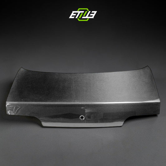 R32 OEM style trunk with lock hole — bespoke carbon, front view, ETi