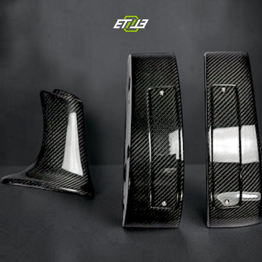 R35 higher-leg rear spoiler — bespoke carbon, side profile, ETi