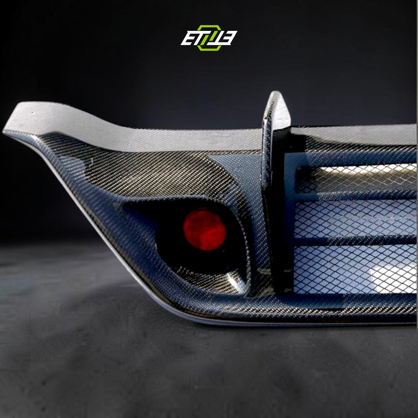 R35 WA style rear diffuser add-on — matte carbon, rear view, ETi