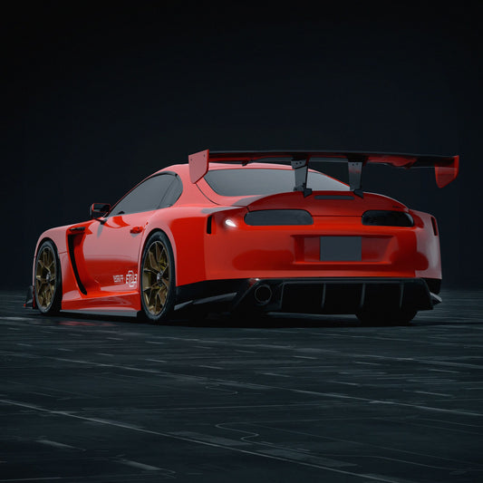 Rear three-quarter view of the red A80 with the widebody kit, carbon rear diffuser and carbon GT wing, studio render
