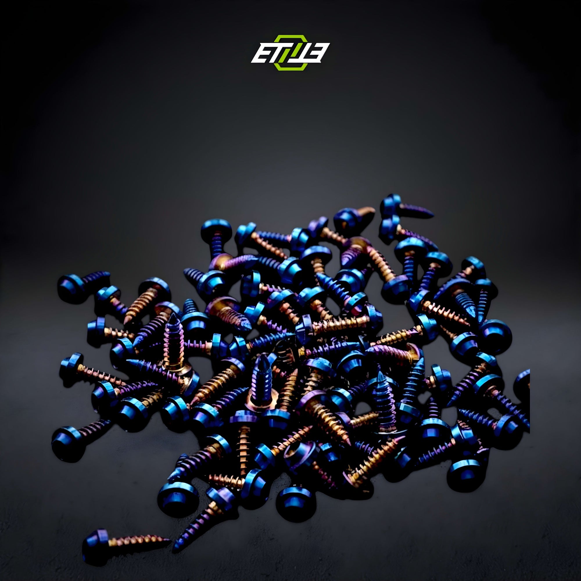 Blue and gold colored fasteners grouped on a dark surface in an ETi catalog image