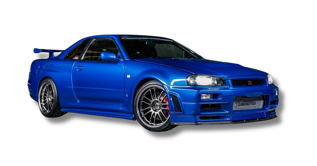 Nissan Skyline R34 GT-R in Bayside Blue with carbon fiber front splitter