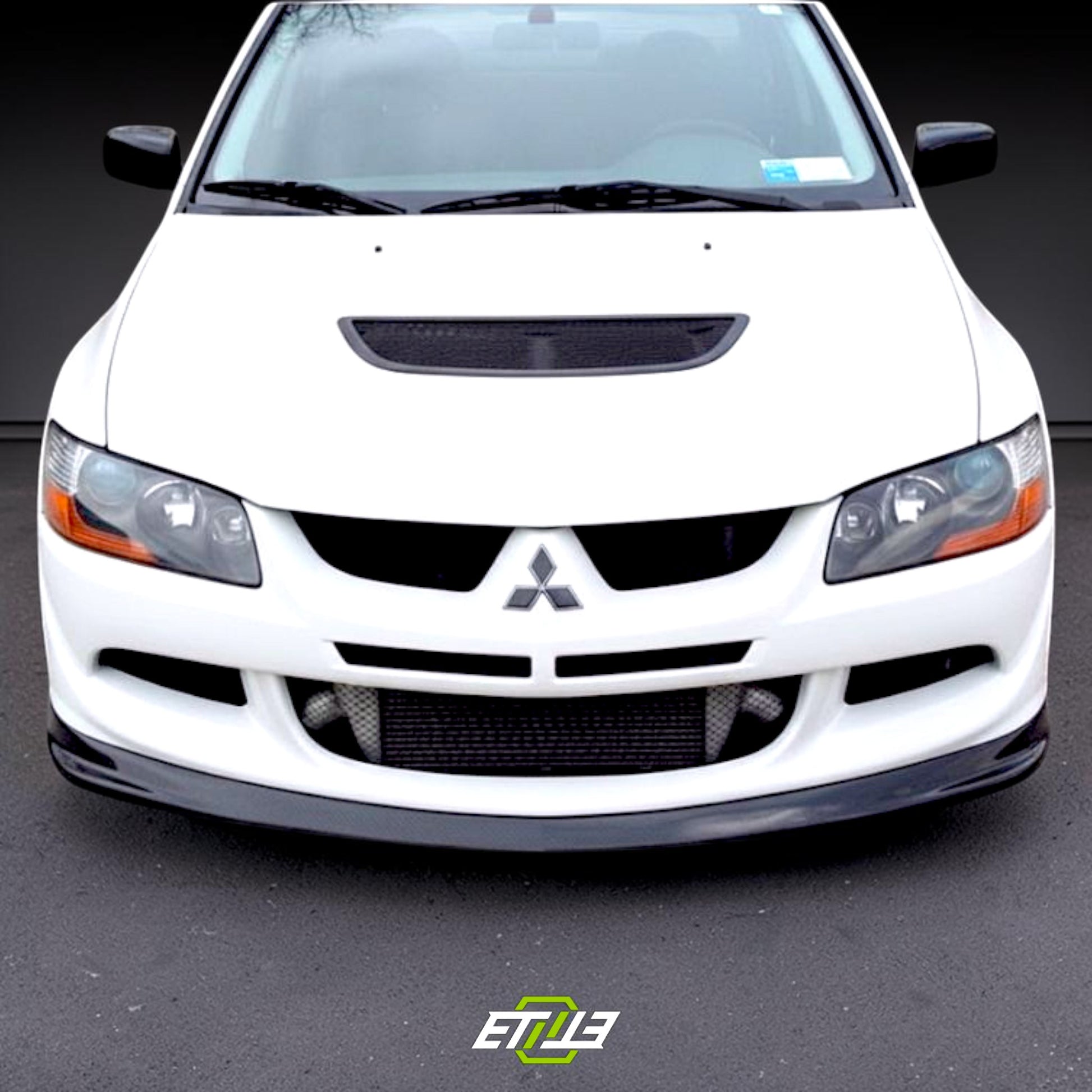 ETi Mitsubishi Evo 8Do-Luck D-Style Carbon Fiber Front Lip | Shopifydevstudio