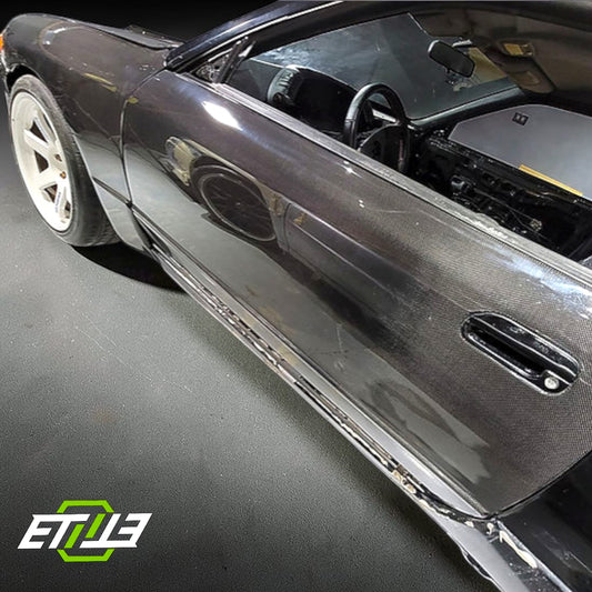 R32 carbon fiber doors — forged carbon finish, ETi