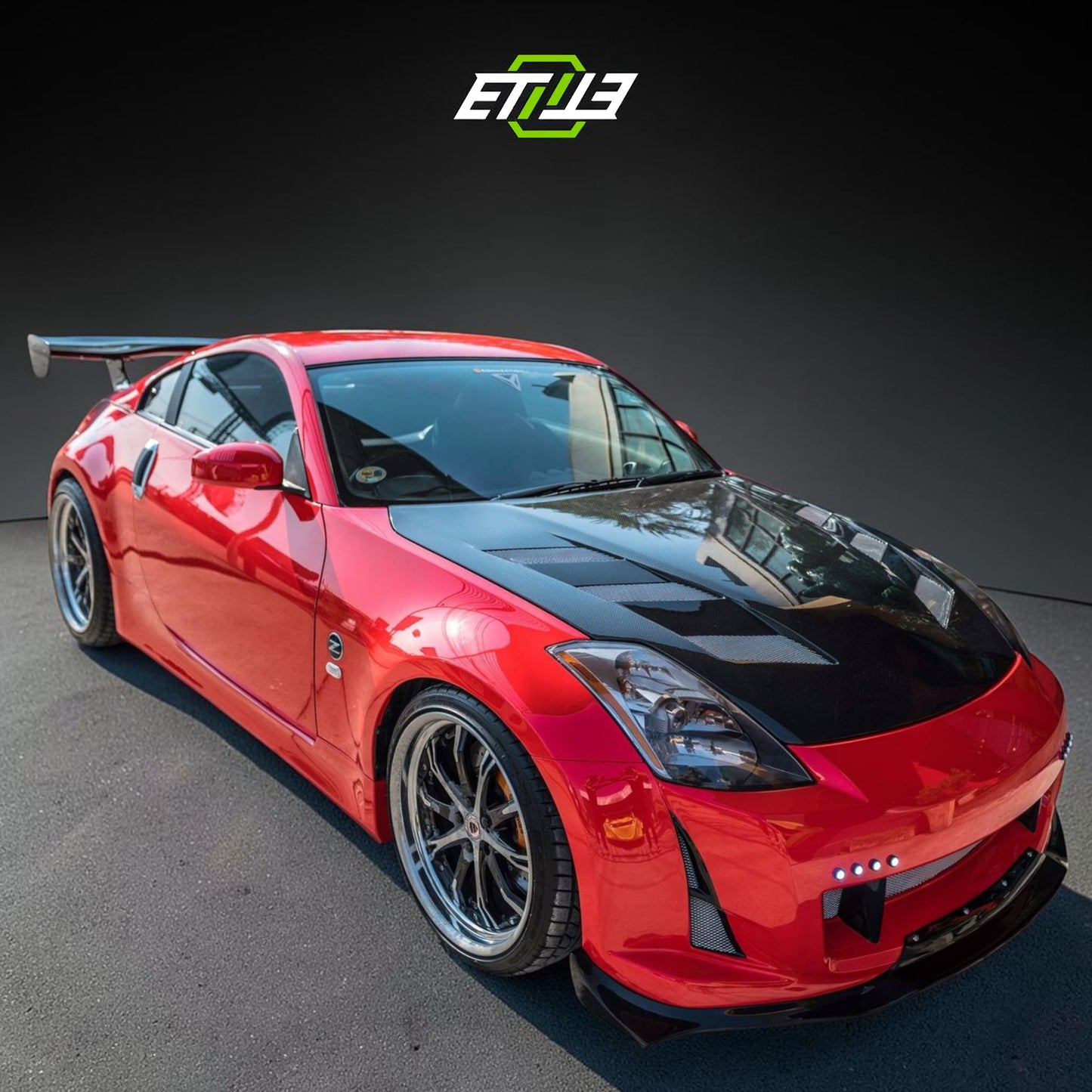 ETi Nissan 350Z MC Superleggera Carbon Fiber Hood | SKU: ETI-HN02100-CF | ID: 10658250883353 | Shopifydevstudio