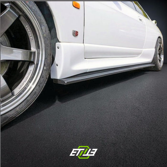 R33 side skirt extension — vacuum-infused carbon, underside detail, ETi