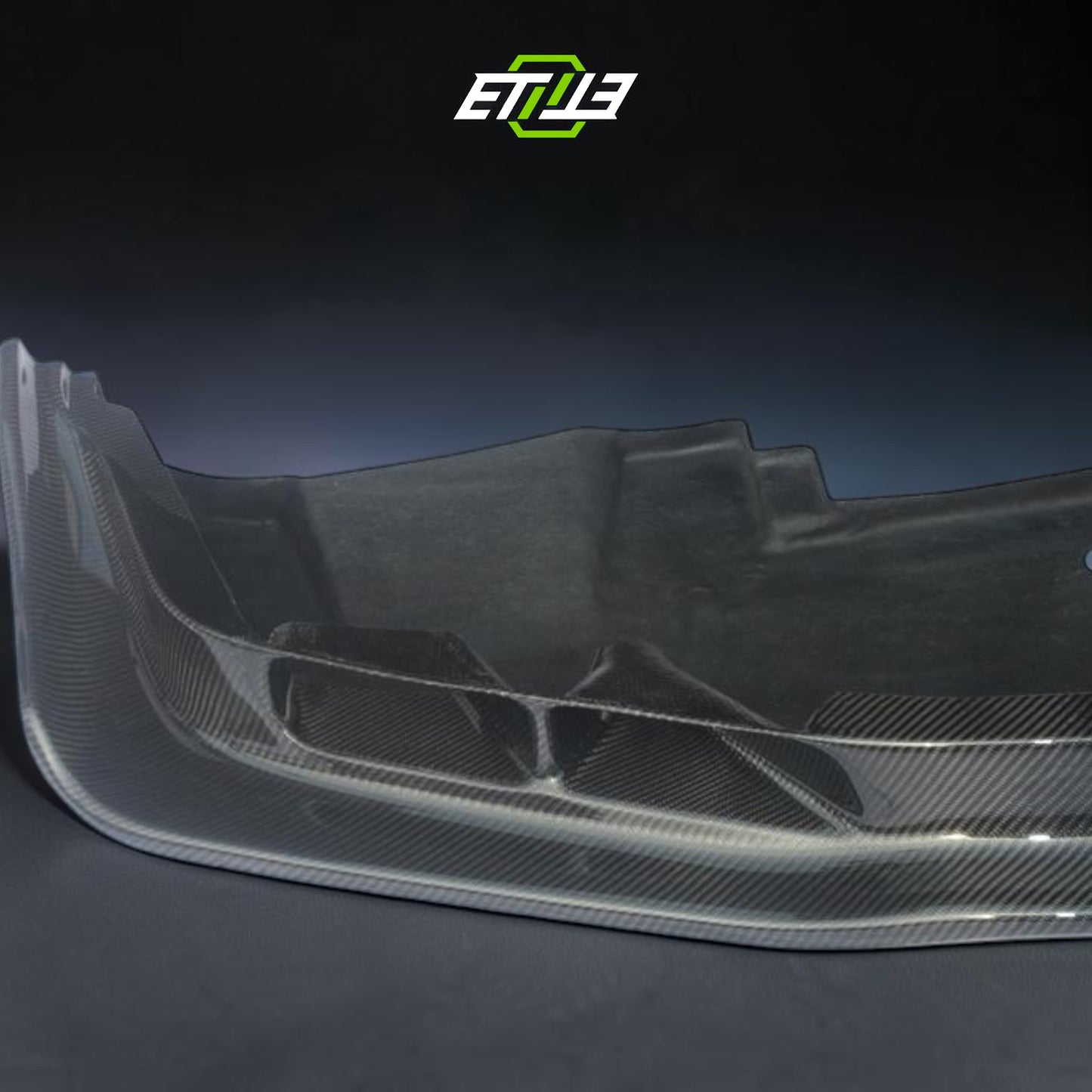 R34 front splitter — bespoke carbon weave detail, ETi