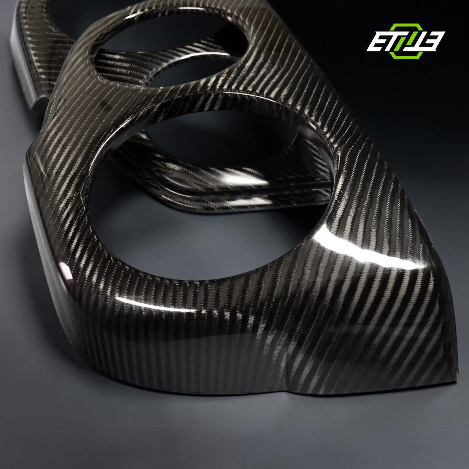 R34 tail light covers — smoked finish, front view, ETi