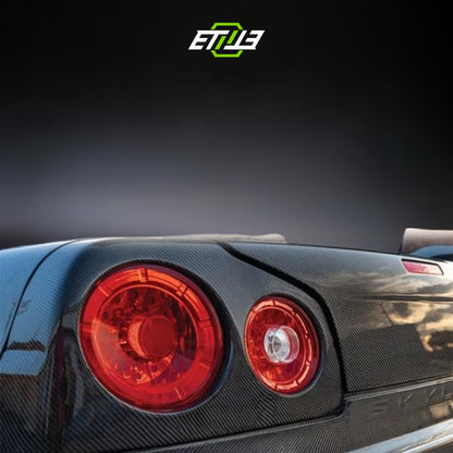 R34 tail light covers — UV-protected smoked finish, ETi