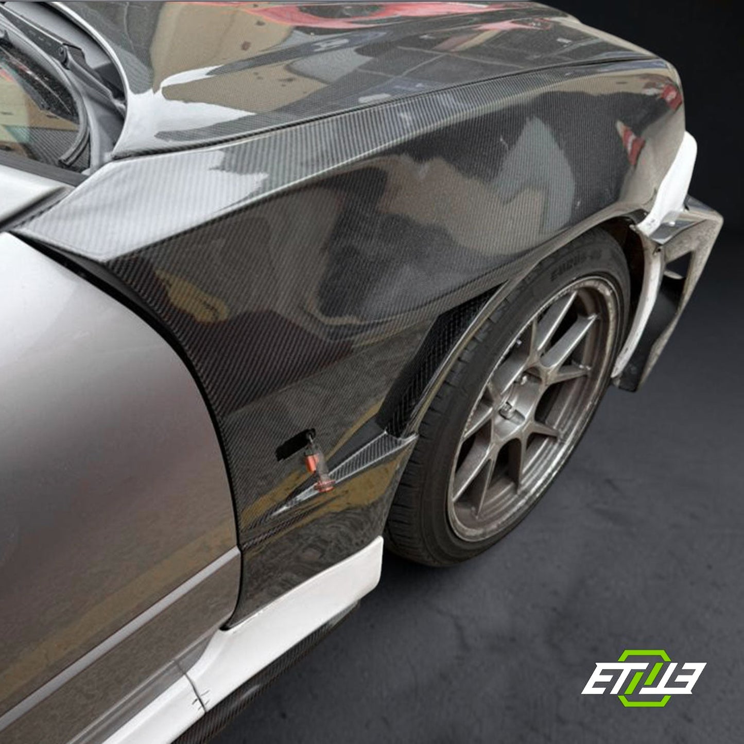 R34 Z-Tune style front fenders — bespoke carbon, rear angle, ETi