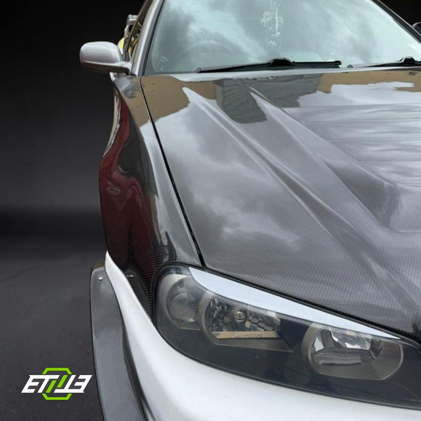 R34 Z-Tune style front fender — bespoke carbon, mounting detail, ETi
