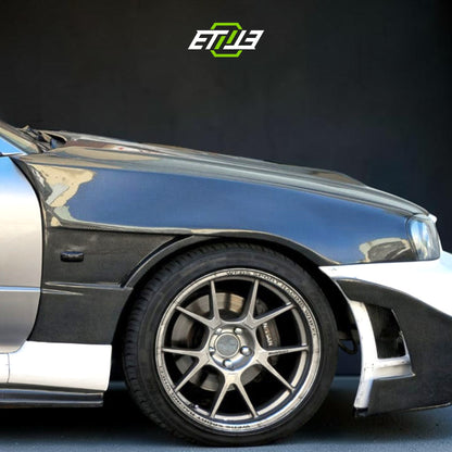 R34 Z-Tune style front fenders — bespoke carbon, studio view, ETi