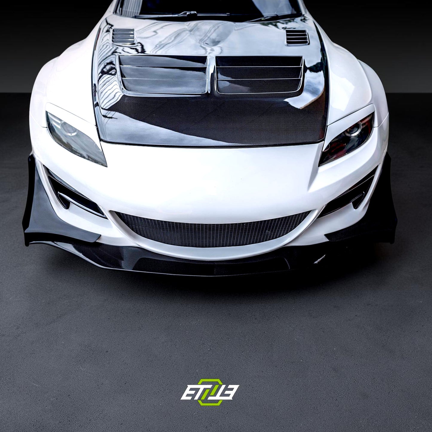 Mazda RX-8 R-Magic Carbon Fiber Hood | SKU: ETI-HM01434-CF | ID: 10627884515609 | Shopifydevstudio