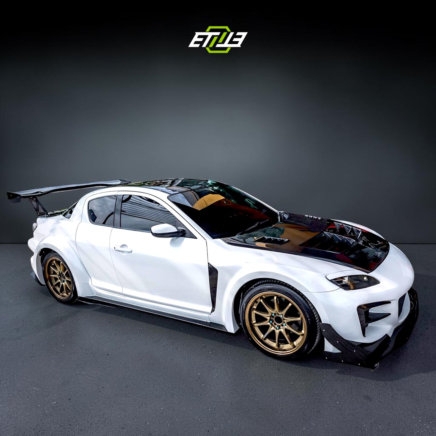 Mazda RX-8 R-Magic Carbon Fiber Hood | SKU: ETI-HM01434-CF | ID: 10627884515609 | Shopifydevstudio