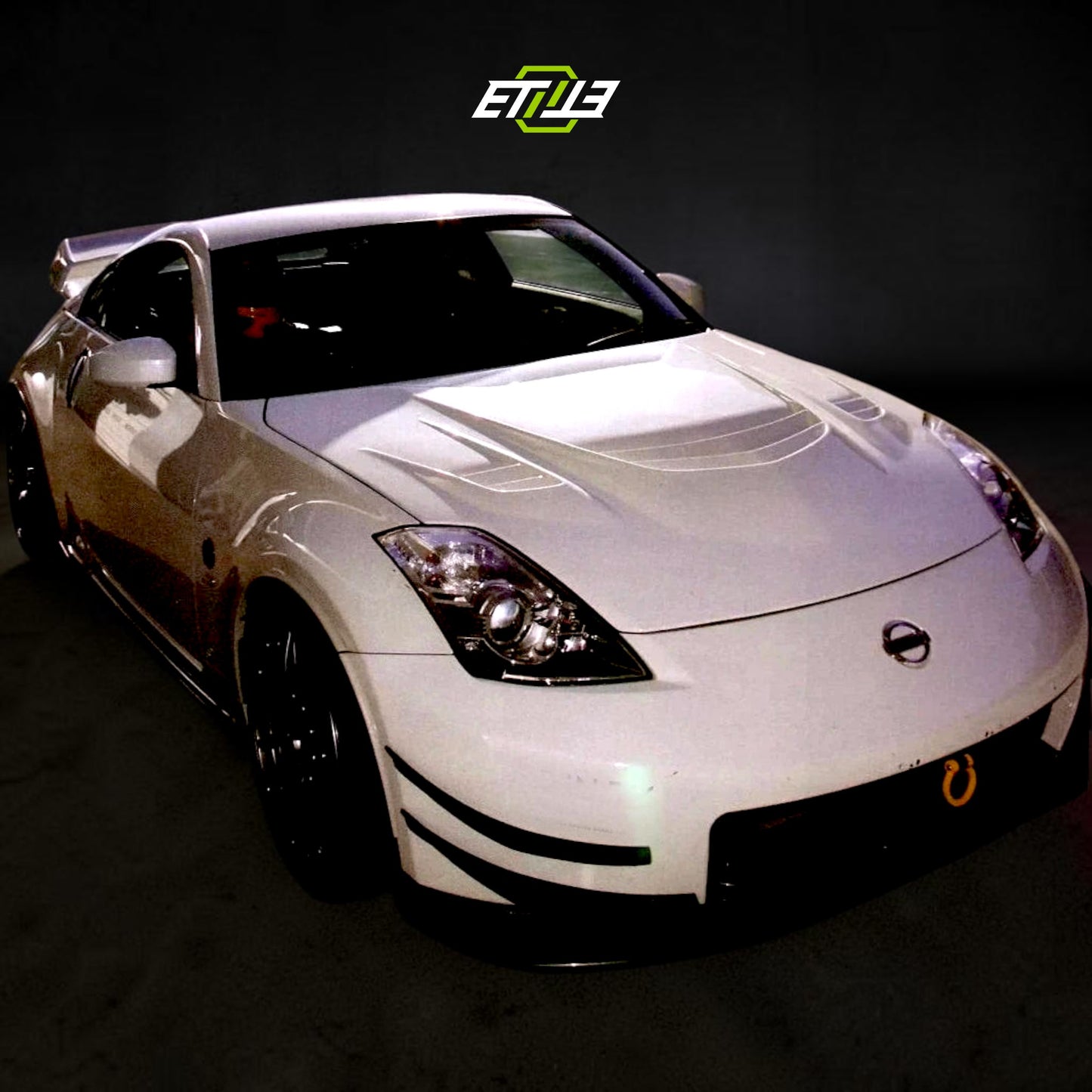 Nissan 350Z MC MCR Style Carbon Fiber Hood | SKU: ETI-HN01087-CF | ID: 10658250752281 | Shopifydevstudio