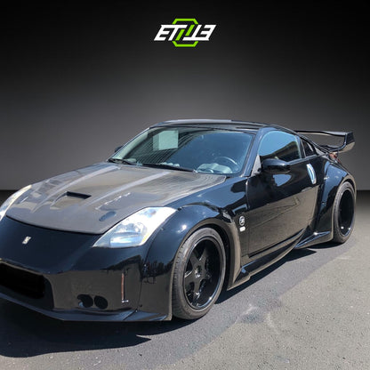 Nissan 350Z Veilside Style Carbon Fiber Hood | SKU: ETI-HN00822-CF | ID: 10658250555673 | Shopifydevstudio
