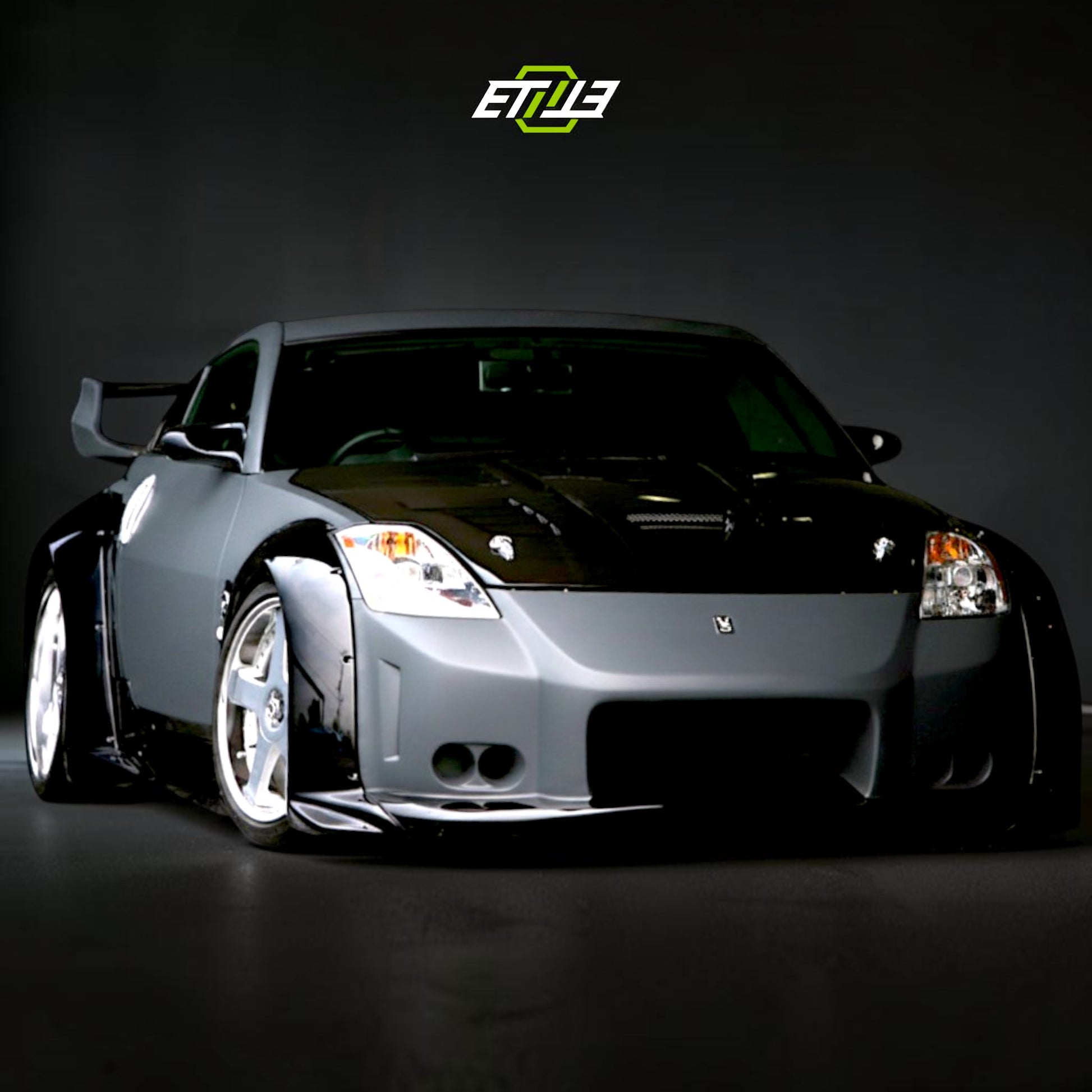 Nissan 350Z Veilside Style Carbon Fiber Hood | SKU: ETI-HN00822-CF | ID: 10658250555673 | Shopifydevstudio