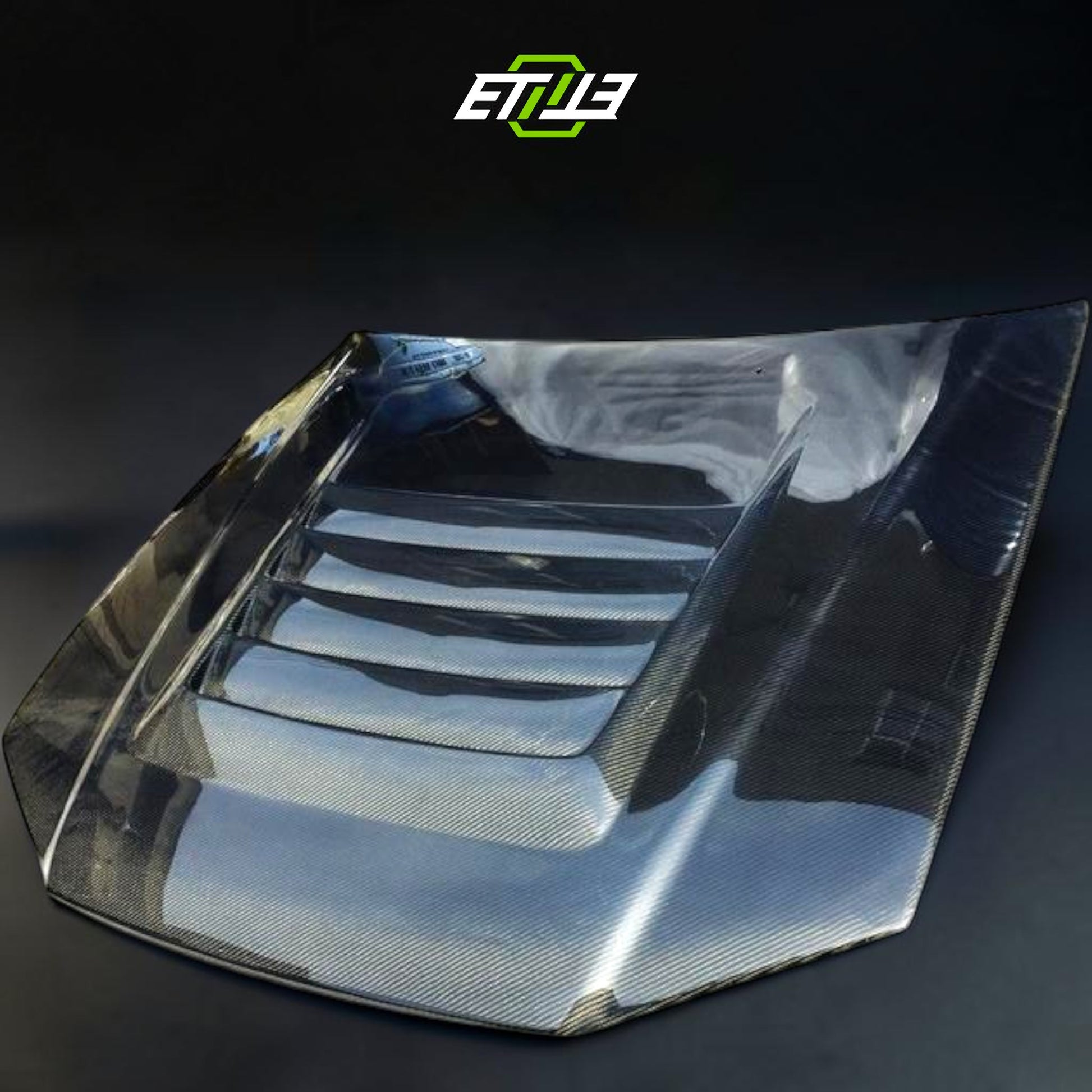 Nissan R34 Nismo Style Carbon Fiber Hood | SKU: ETI-HN00786-CF | ID: 10658250064153 | Shopifydevstudio