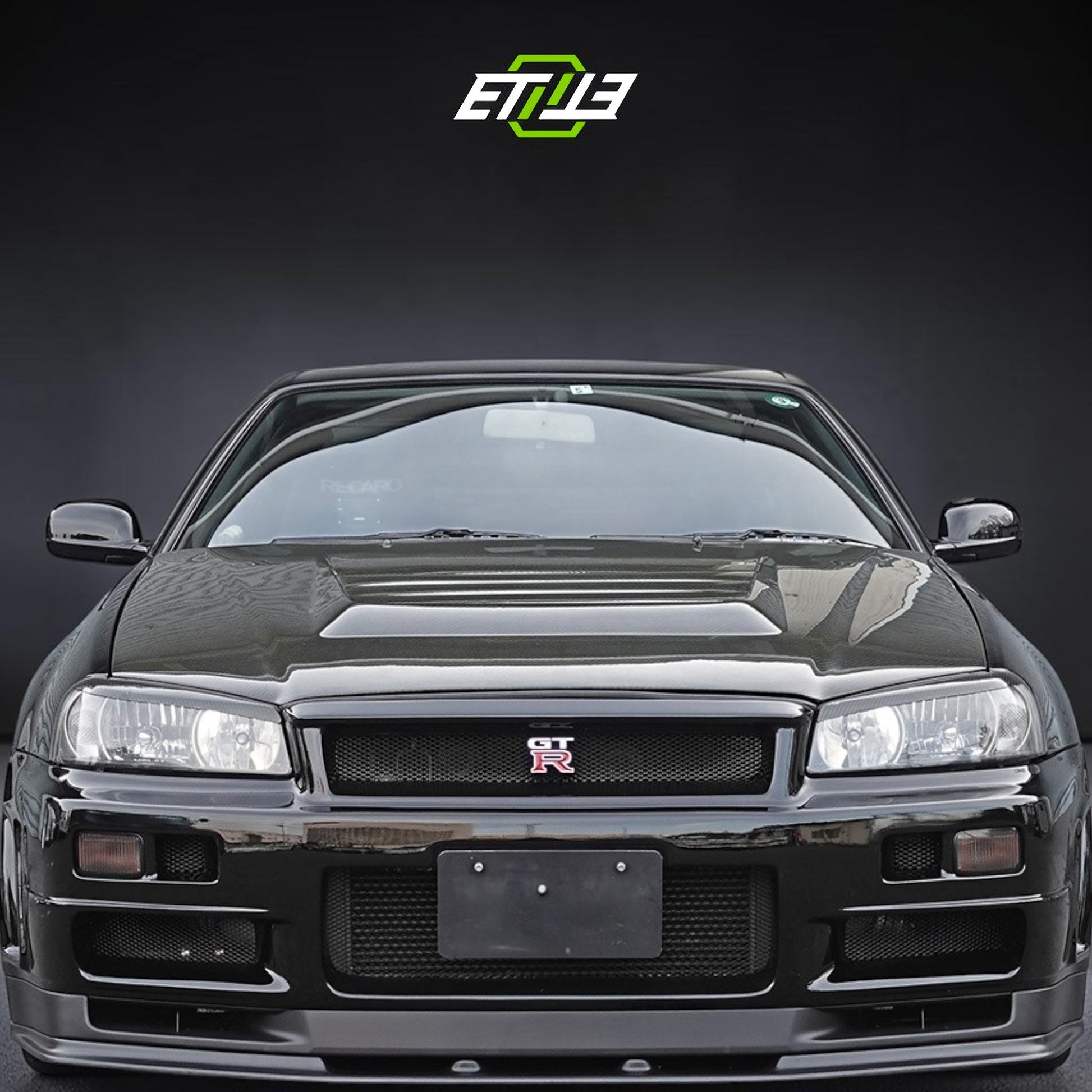 Nissan R34 Nismo Style Carbon Fiber Hood | SKU: ETI-HN00786-CF | ID: 10658250064153 | Shopifydevstudio