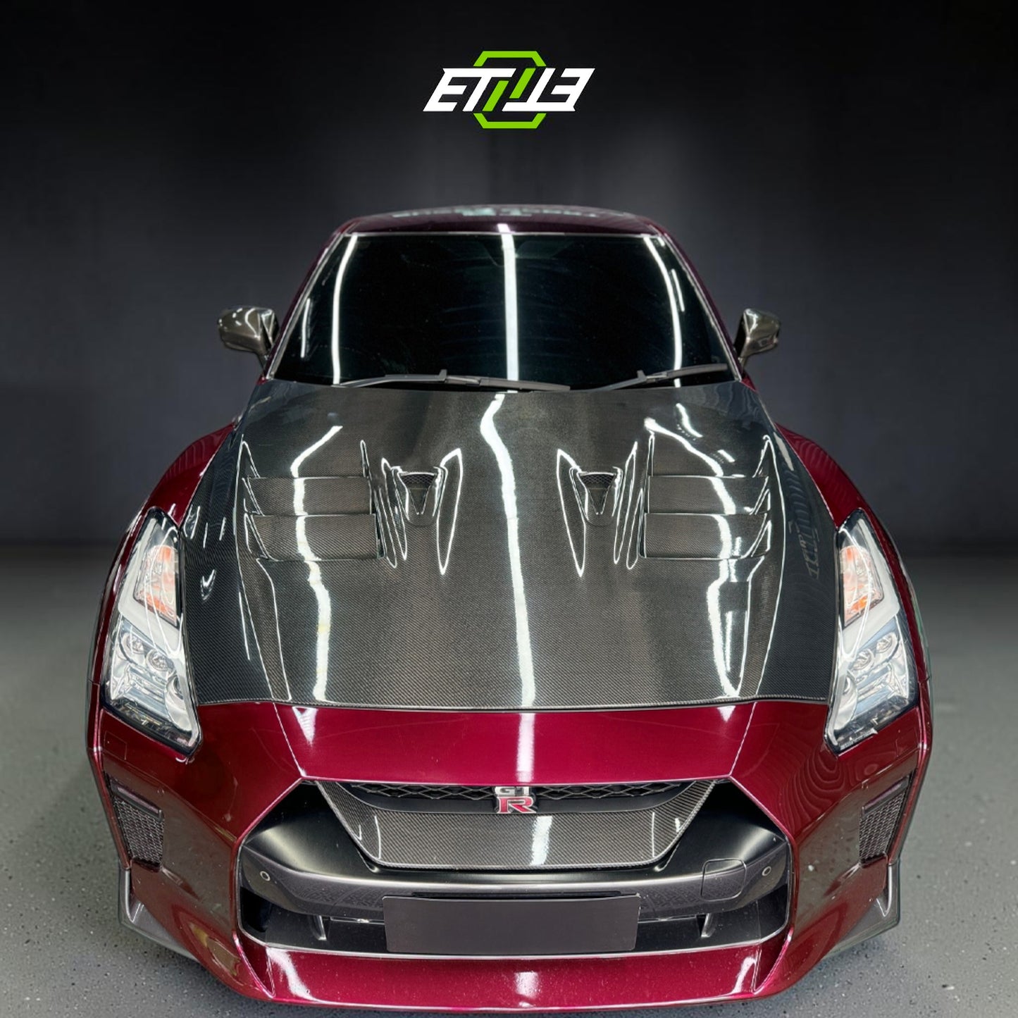 Nissan R35 08-15 Top Secret Style Carbon Fiber Hood | SKU: ETI-HN01645-CF | ID: 10658250162457 | Shopifydevstudio