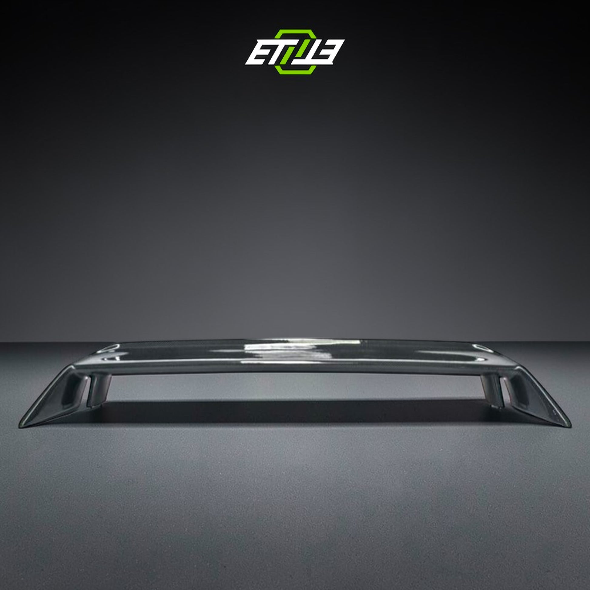 R32 OEM-style rear spoiler — bespoke carbon, rear three-quarter view, ETi
