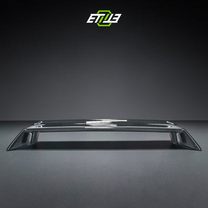 R32 OEM-style rear spoiler — bespoke carbon, rear three-quarter view, ETi