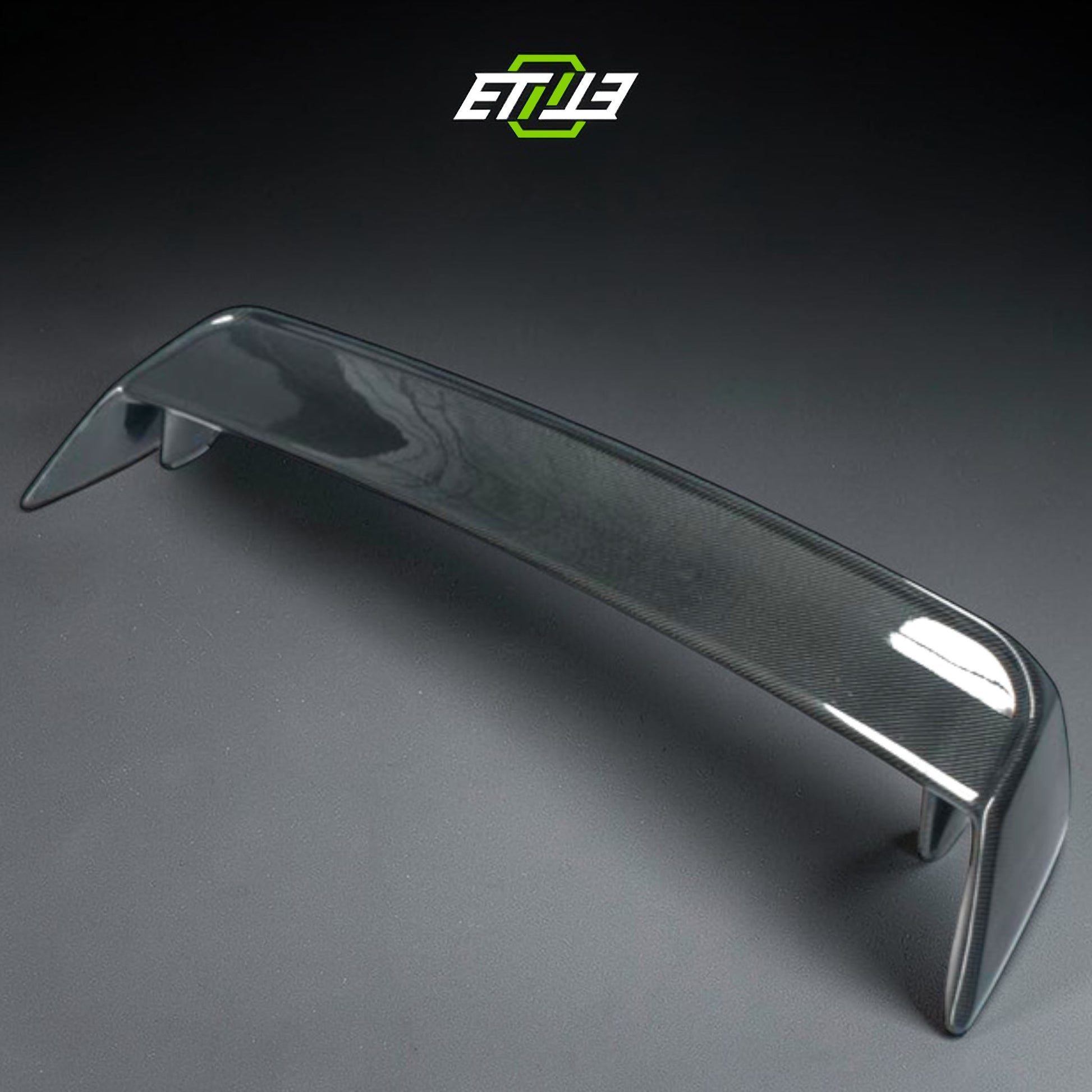 R32 OEM-style rear spoiler — bespoke carbon, underside detail, ETi