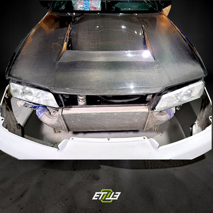 R32 NS hood lip — gloss carbon, fitted on car, ETi