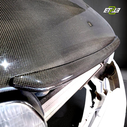 R32 NS hood lip — gloss carbon, edge detail, ETi