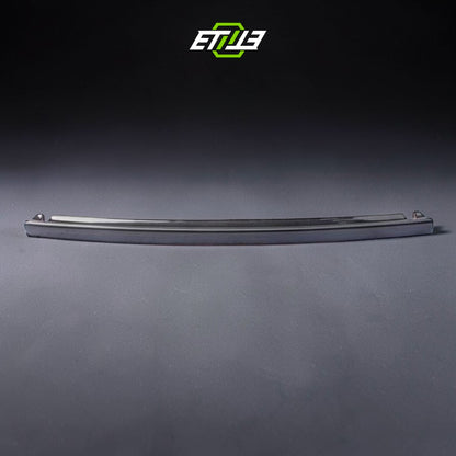 R32 NS trunk spoiler — gloss carbon fiber, front view, ETi