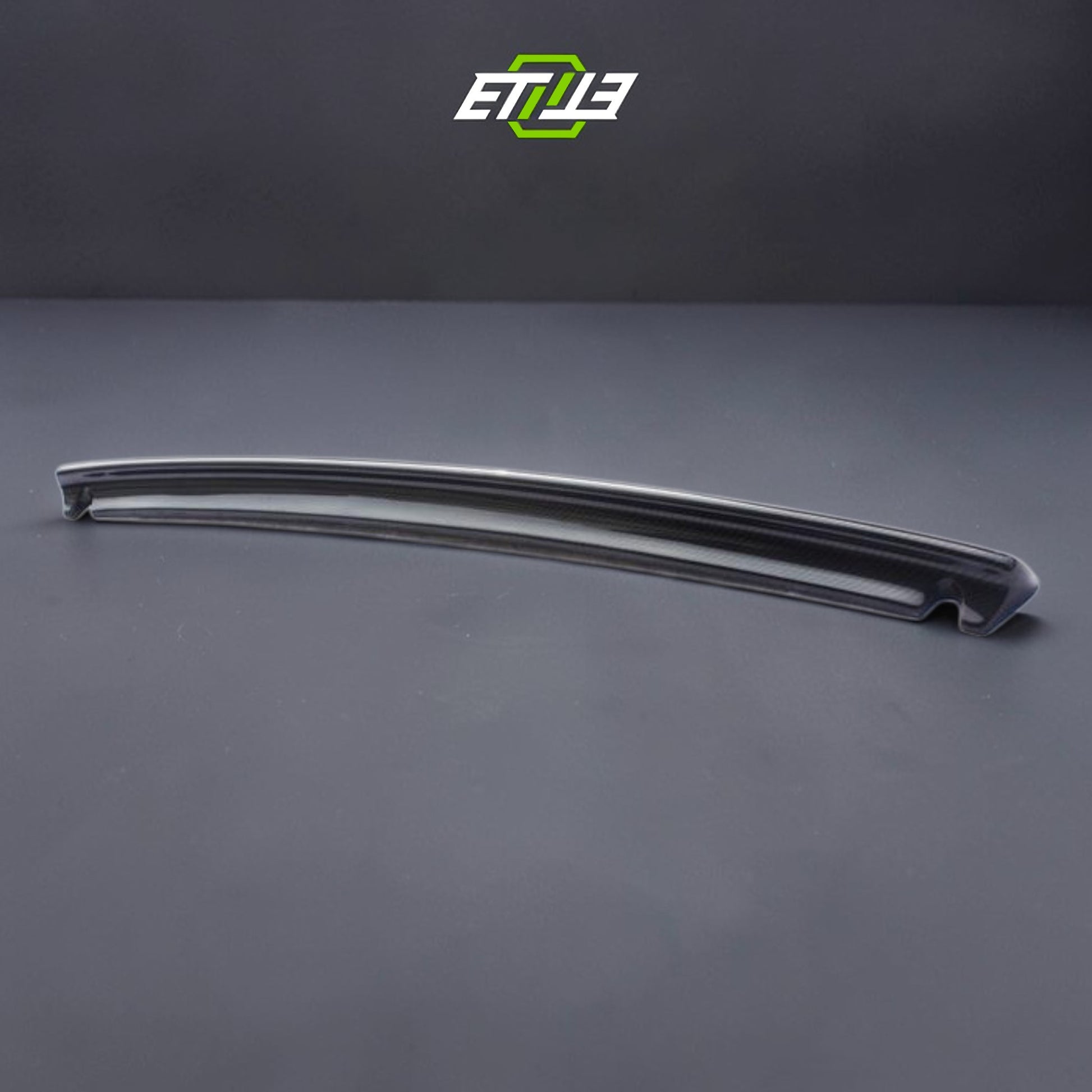 R32 NS trunk spoiler — matte carbon fiber finish, ETi