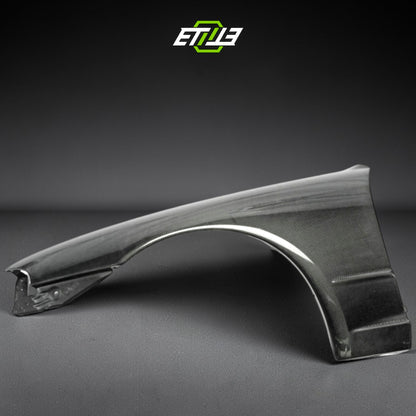 R32 OEM style front fenders — bespoke carbon, mounting edge detail, ETi