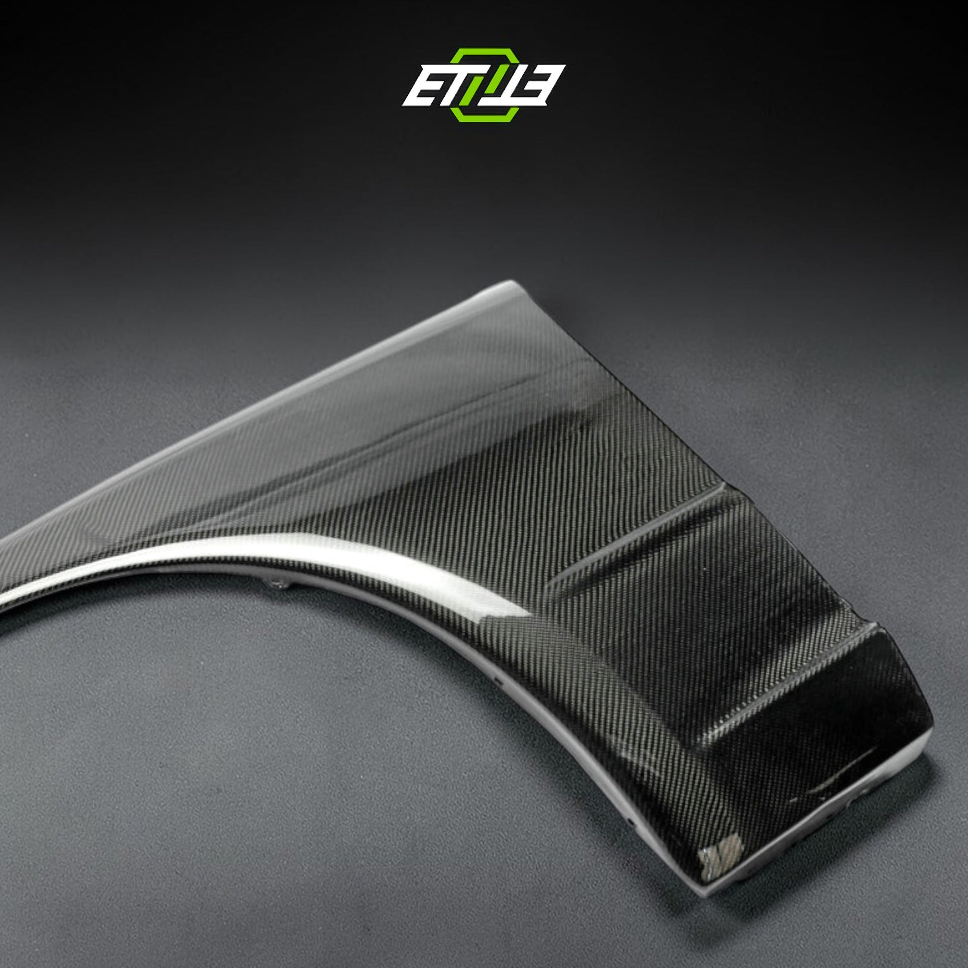 R32 OEM style front fenders — bespoke carbon, rear three-quarter view, ETi