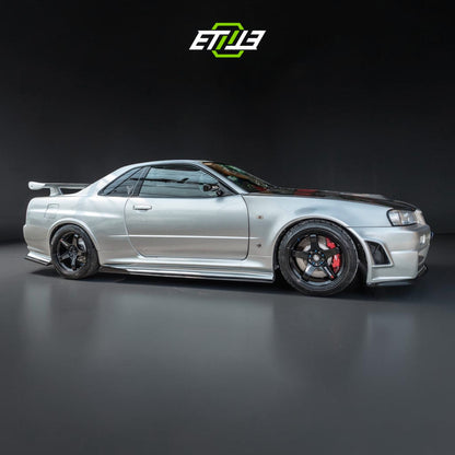R34 Z-Tune style carbon vented hood — dry carbon weave detail, ETi