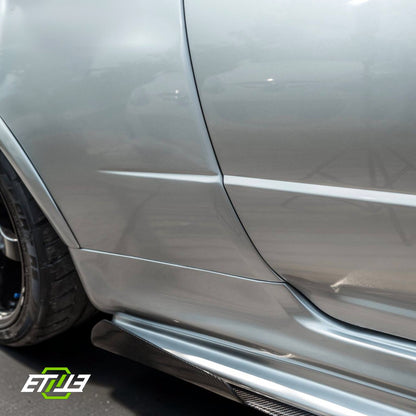 R34 Z-Tune style carbon vented hood — bespoke carbon, three-quarter view, ETi