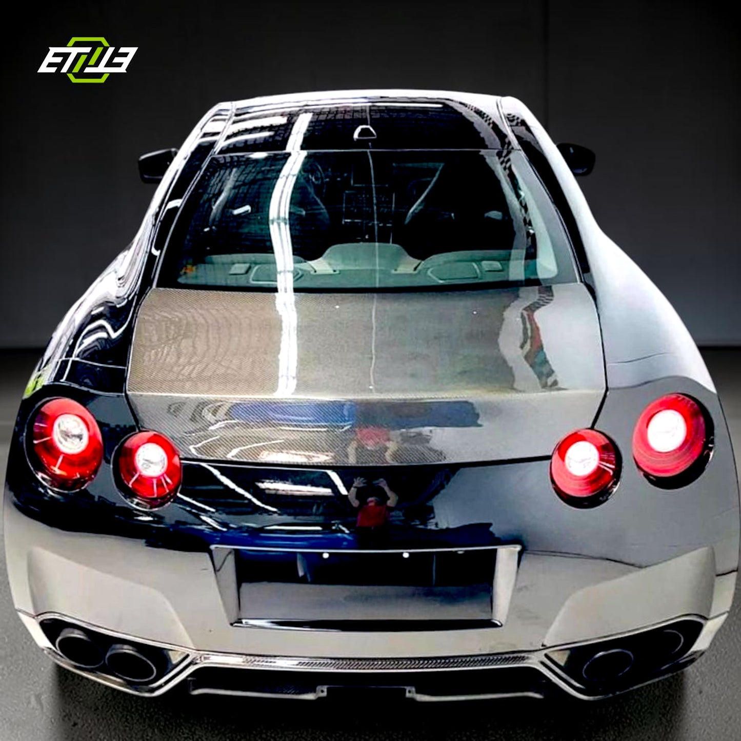 R35 OEM style trunk — bespoke carbon fiber, rear view, ETi