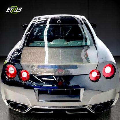 R35 OEM style trunk — bespoke carbon fiber, rear view, ETi
