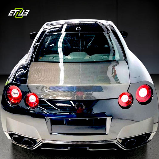 R35 OEM style trunk — bespoke carbon fiber, rear view, ETi