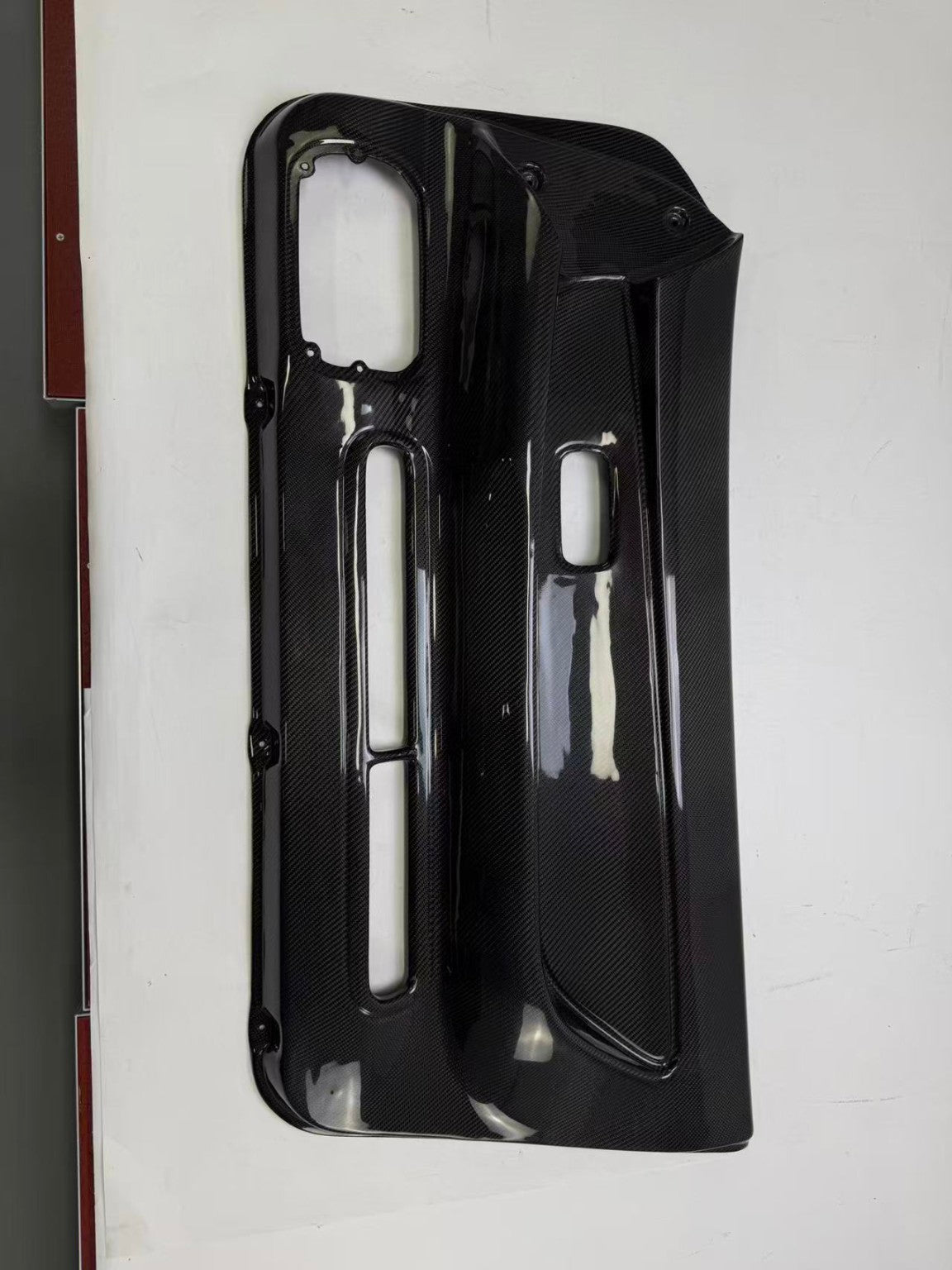 Nissan Skyline R32 carbon fiber door card - gloss carbon front view
