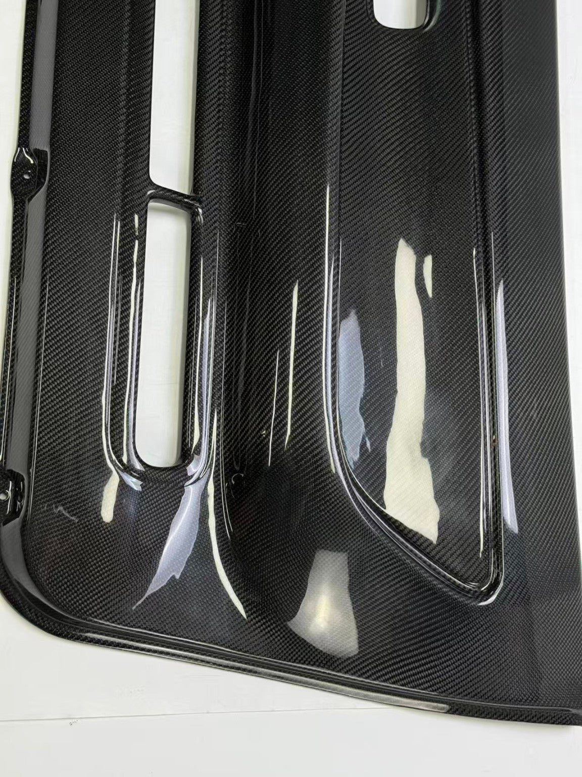 Nissan Skyline R32 carbon fiber door card - gloss carbon weave detail