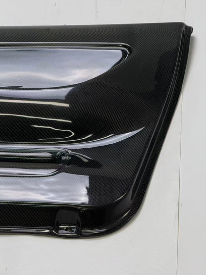 Nissan Skyline R32 carbon fiber door card - edge profile and surface finish detail