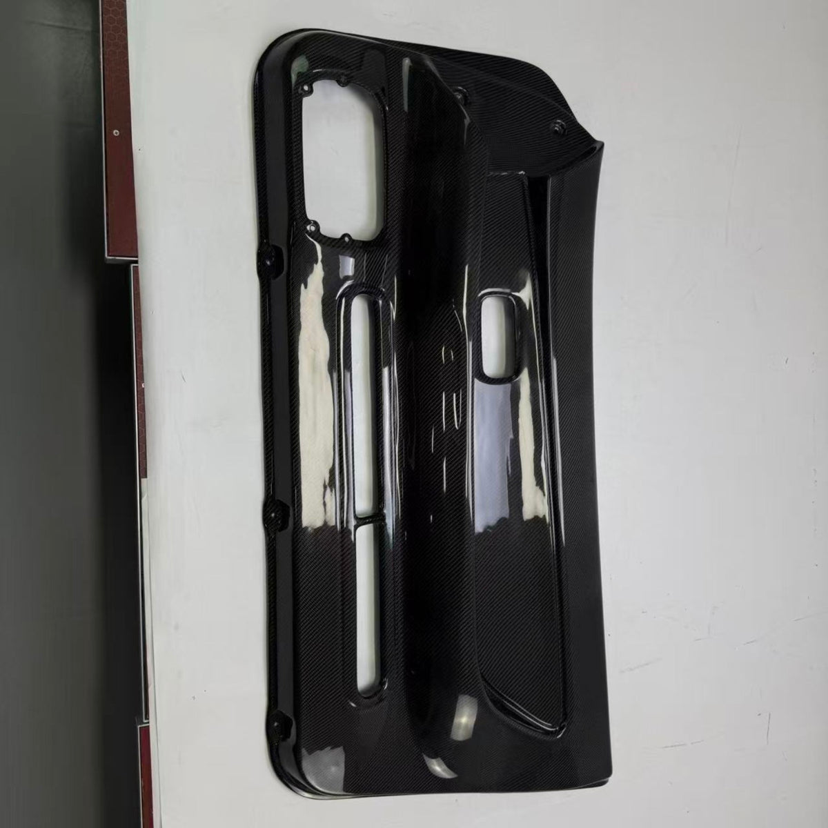 Nissan Skyline R32 carbon fiber door card - gloss carbon full front view