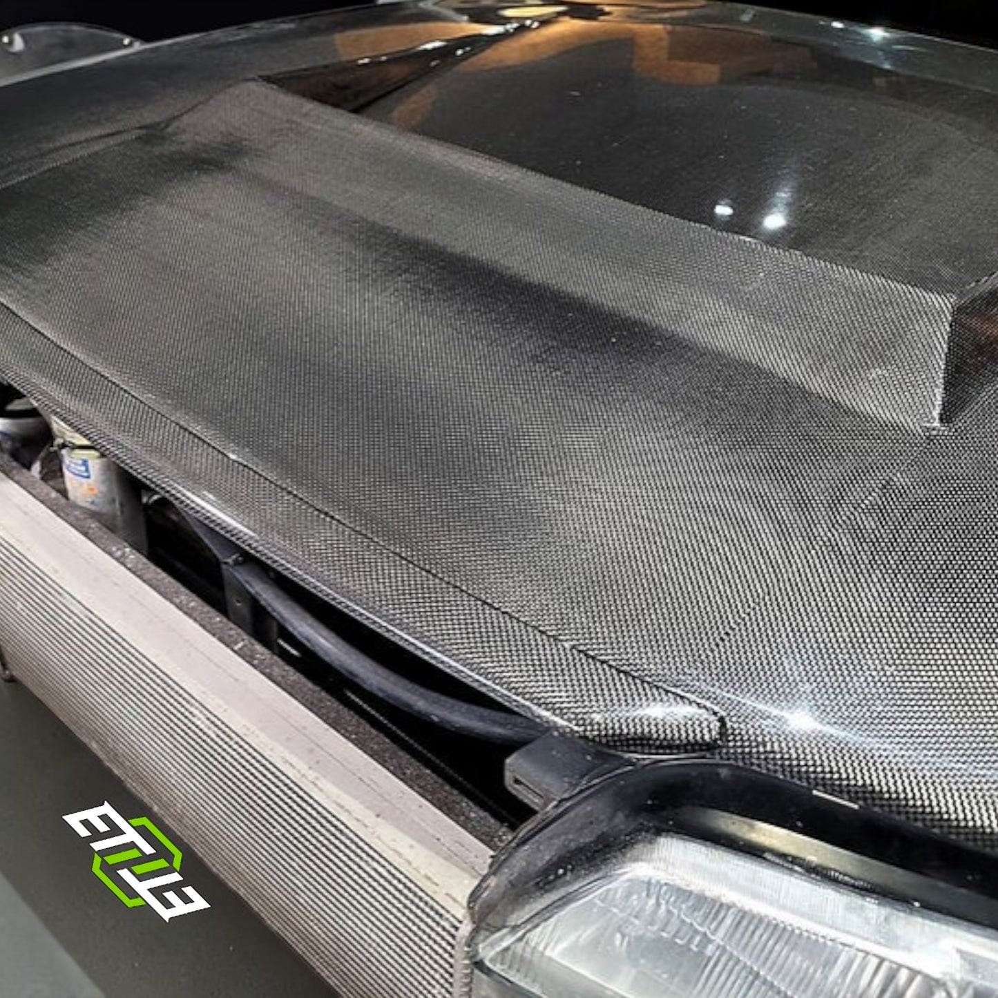 R32 GTR NI Style Bonnet Hood Lip | SKU: R32-CF-8 | ID: 10658246263065 | Shopifydevstudio