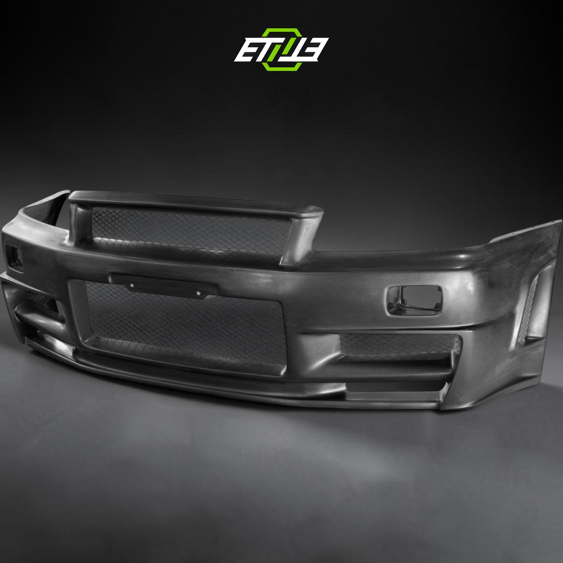 R34 GTR NI Z-Tune Style Front Bumper | SKU: R34-CF-22 | ID: 10658244854041 | Shopifydevstudio